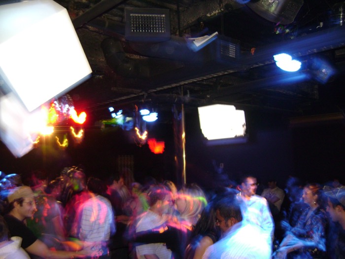 Blurred lights and crowd motion on the dance floor
